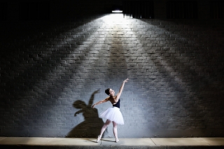 UGA college bound high school senior dances around the city streets for her senior pictures by Starr Petronella.